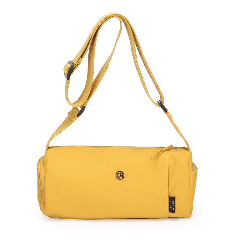 Simple Japanese shoulder bag women's nylon anti-splashing cylinder pillow bag trendy cool messenger bag commuter portable handbag
