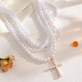 Stacked necklaces wholesale european and american cross-border retro imitation pearl light luxury sweet cool pendant women's pearl cross necklace