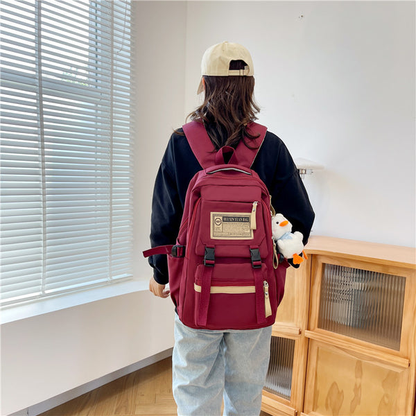 Wholesale large capacity student backpack junior high school student schoolbag college student backpack wind simple backpack computer bag