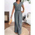 Women's v-neck short sleeve jumpsuit with button-front, elastic waist, wide leg, and pockets - perfect for everyday casual wear