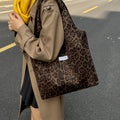 Fall and winterretro leopard print shoulder canvas bag large capacity tote bag niche styleeasiest for matchwork clothing bag college student class bag