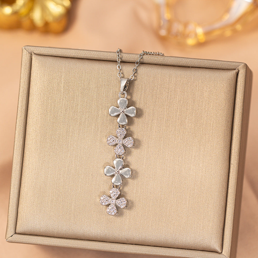 [titanium steel] cross-border popular diamond-filled four-leaf clover long necklace for women, accessible luxury, high-end niche clavicle chain jewelry