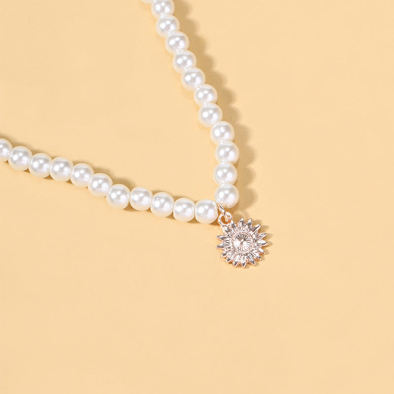 Pearl necklace wholesale fashion cross-border pendant jewelry alloy sun niche light luxury high-end sweater necklace for women
