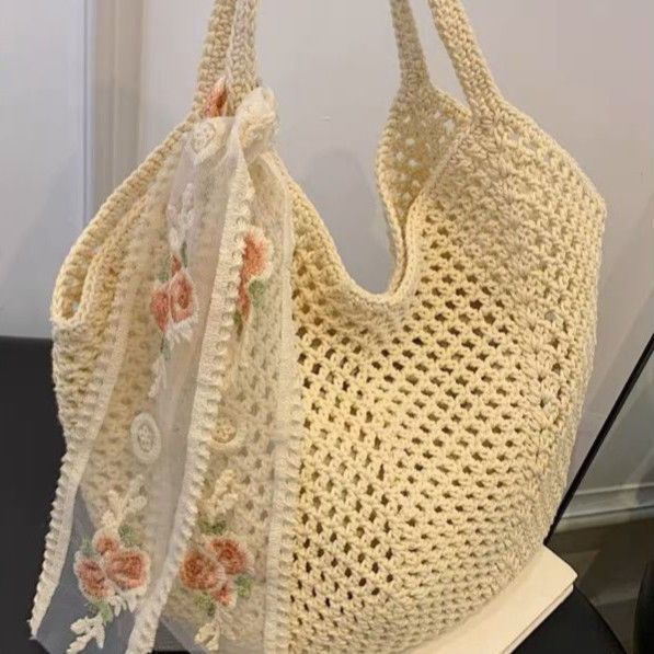 Lazy wind underarm bag women's summer large-capacity cotton thread hollow woven bag seaside vacation shoulder tote bag flower