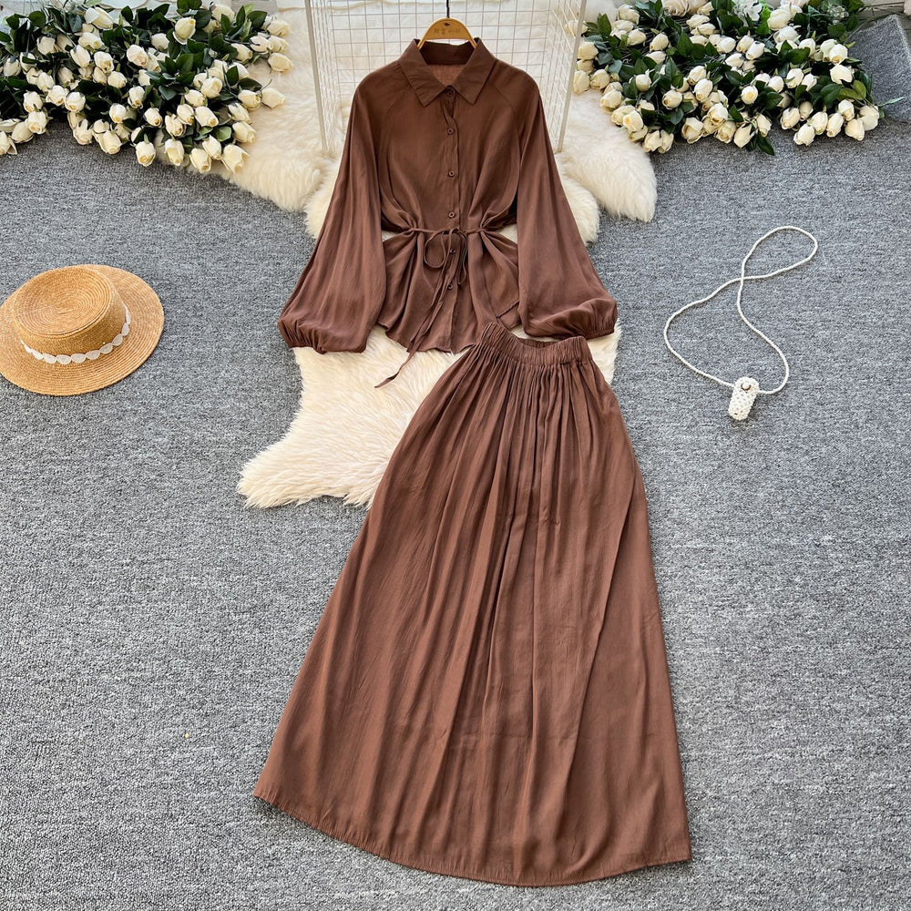 Minimalist solid color elegant women's spring outfit: bubble sleeve tie-up blouse + elastic waist slimming midi skirt