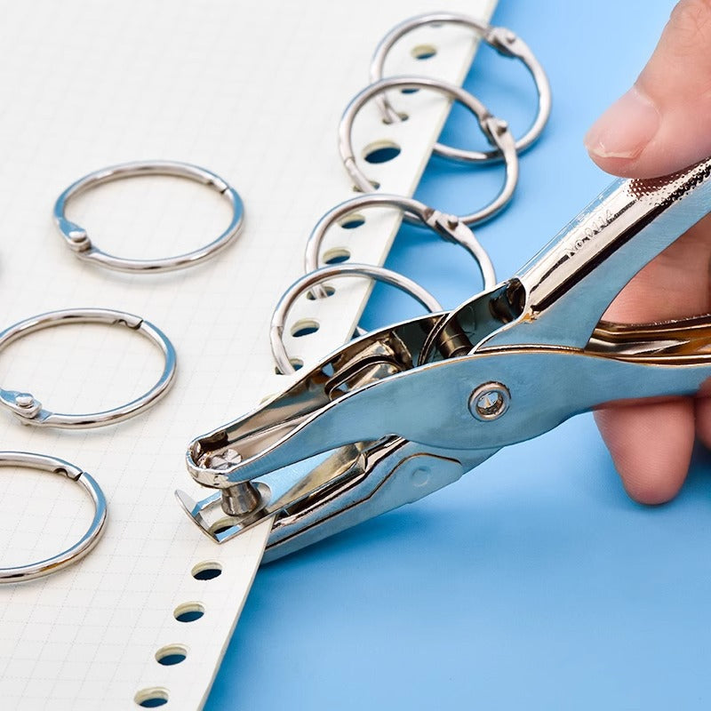 Deli 0111 hole punch, hole punching machine loose-leaf paper single hole household small manual clothing tag cardboard batch manual