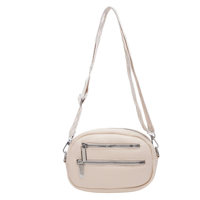 Cross-border Korean version of the new girl's mobile phone breast bag, simple pu messenger bag, trendy fashion zipper women's shoulder small round bag