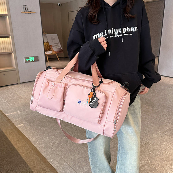 Oxford cloth sports multi-pocket fitness bag, light portable short-distance travel bag can be put on a tie rod duffel bag.
