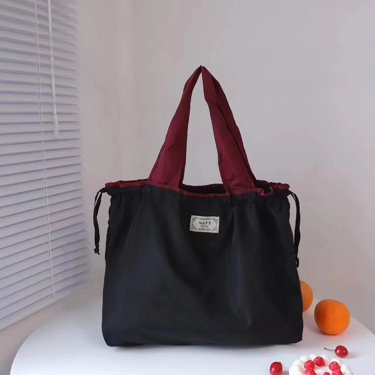 Solid color folding shopping bag, waterproof storage bag, portable supermarket grocery bag, large capacity drawstring, environmentally friendly handbag.