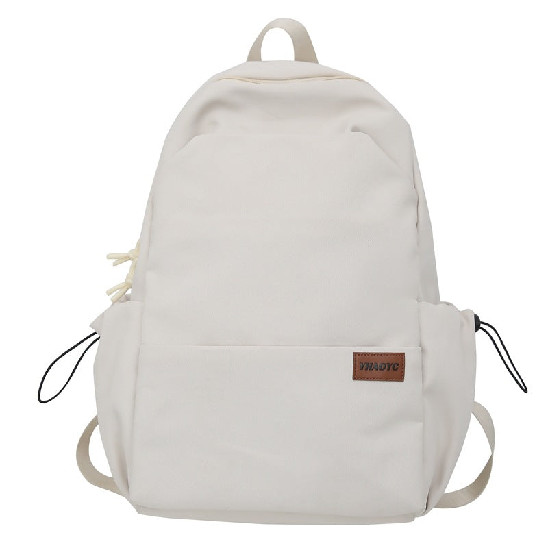 New solid color junior high school student large-capacity backpack male backpack schoolbag male college student business travel backpack