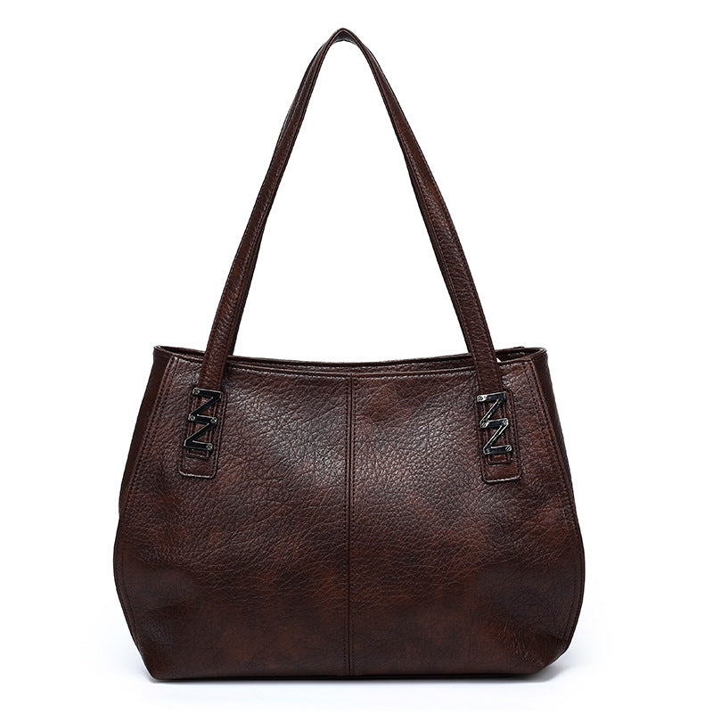 wholesale women's bags 2026: fashionable, minimalist, casual tote bags, large capacity soft leather shoulder bags, new mom bags
