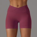 fashion seamless knitting breathable pure color cross waist peach butt yoga shorts running fitness three-quarter pants women