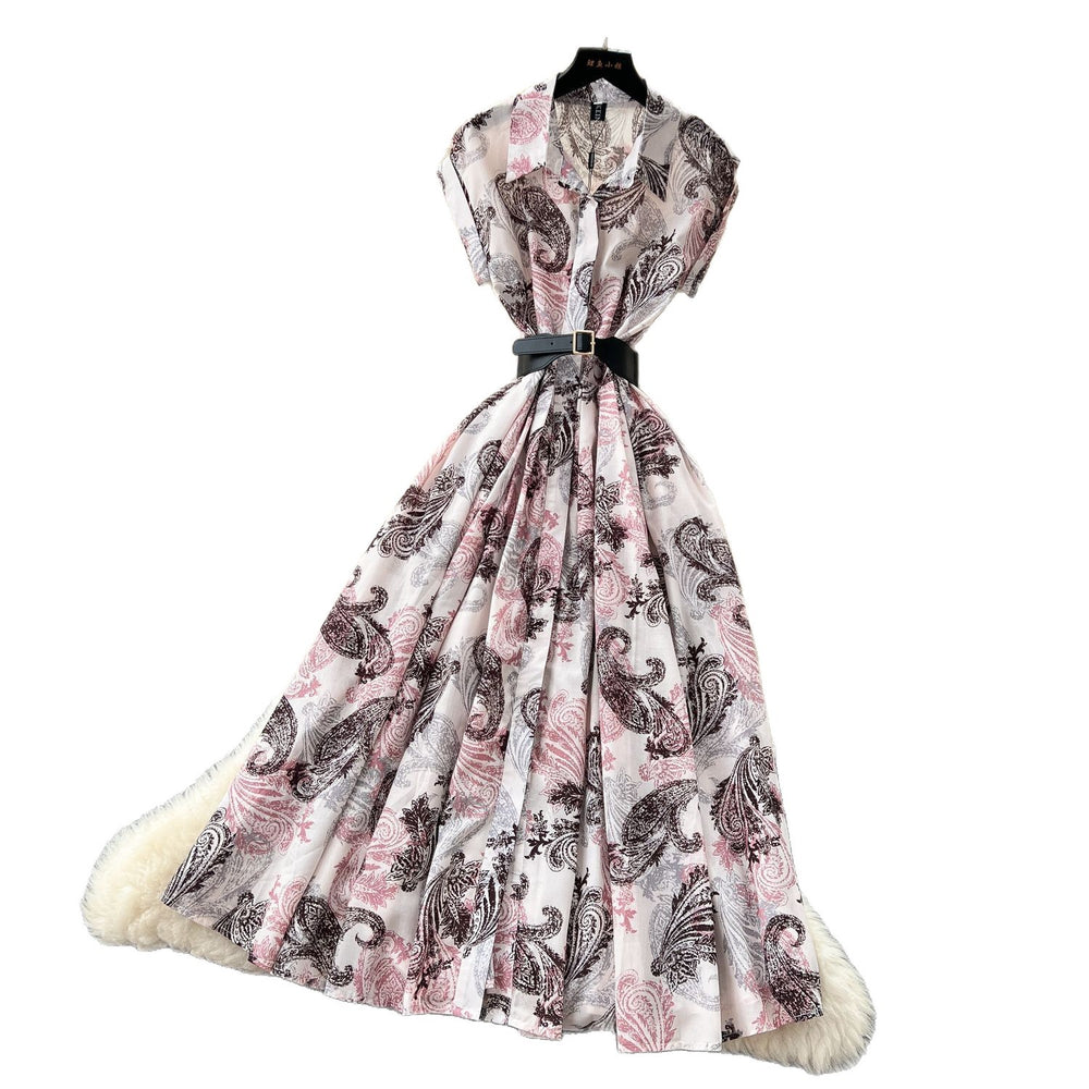 French chic, sophisticated, and unique: tie-waist, short-sleeve, single-breasted, fashionable printed pleated shirt dress with a touch of class