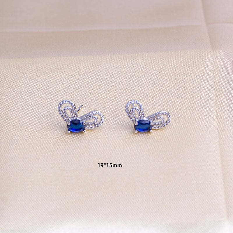 Women's jewelry set: sea blue gemstone flower necklace, earrings, and ring set - minimalist, stylish, and luxurious titanium steel pendant