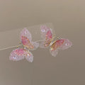 High-end, ethereal gradient 3d butterfly stud earrings for women. unique, niche design, fashionable, elegant, and versatile