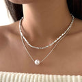 Pearl sweater necklace wholesale cross-border jewelry women's layered high-end light luxury niche irregular autumn and winter clavicle chain