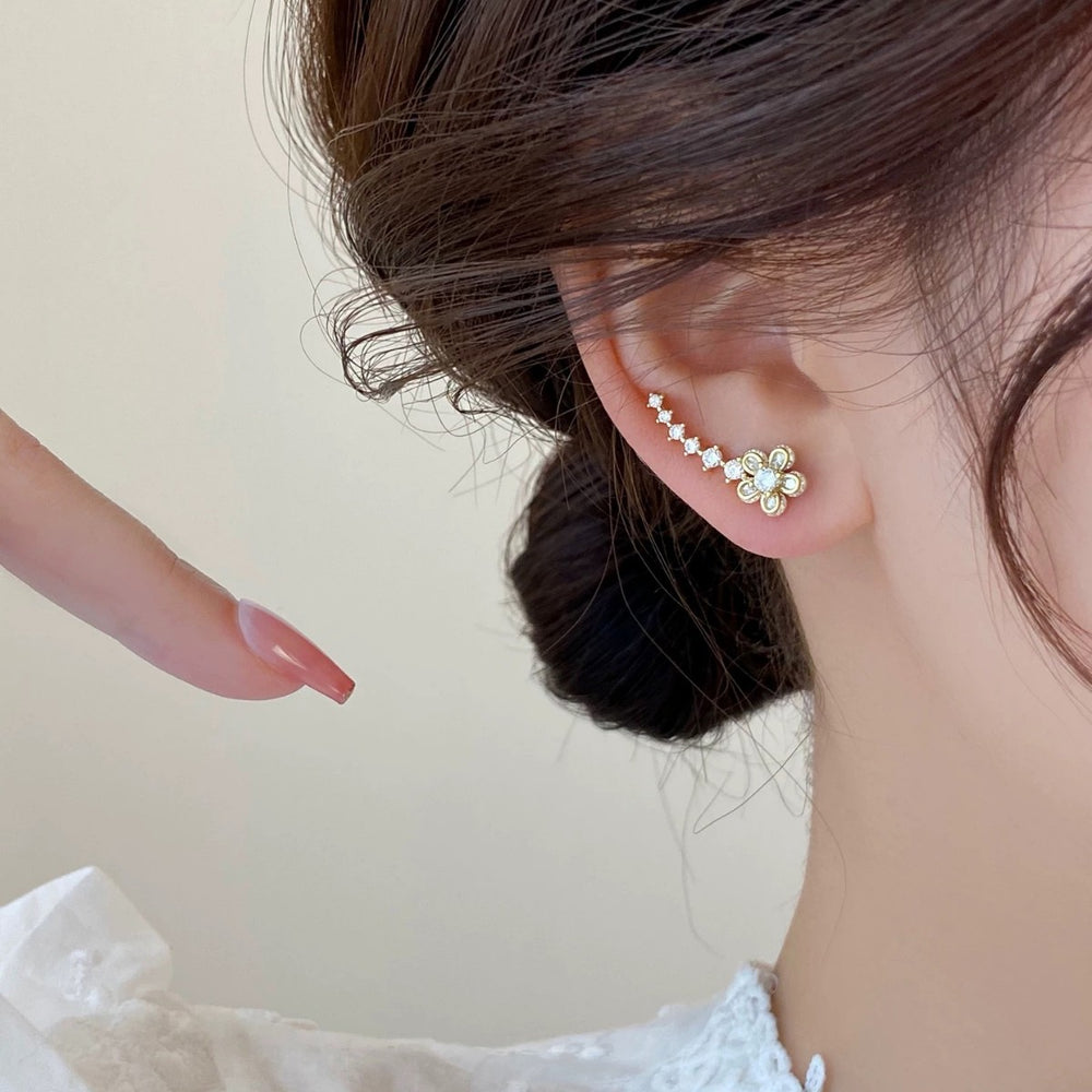 Korean-style exquisite diamond-studded flower stud earrings with an integrated ear row design. a touch of luxury, elegant and chic. trending influencer-approved accessories