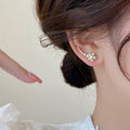 Korean-style exquisite diamond-studded flower stud earrings with an integrated ear row design. a touch of luxury, elegant and chic. trending influencer-approved accessories