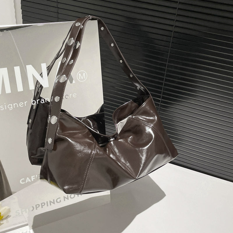 Cross-border European and American style large-capacity rivet punk shoulder bag women's 2025 new fashion personalized underarm bag commuter bag
