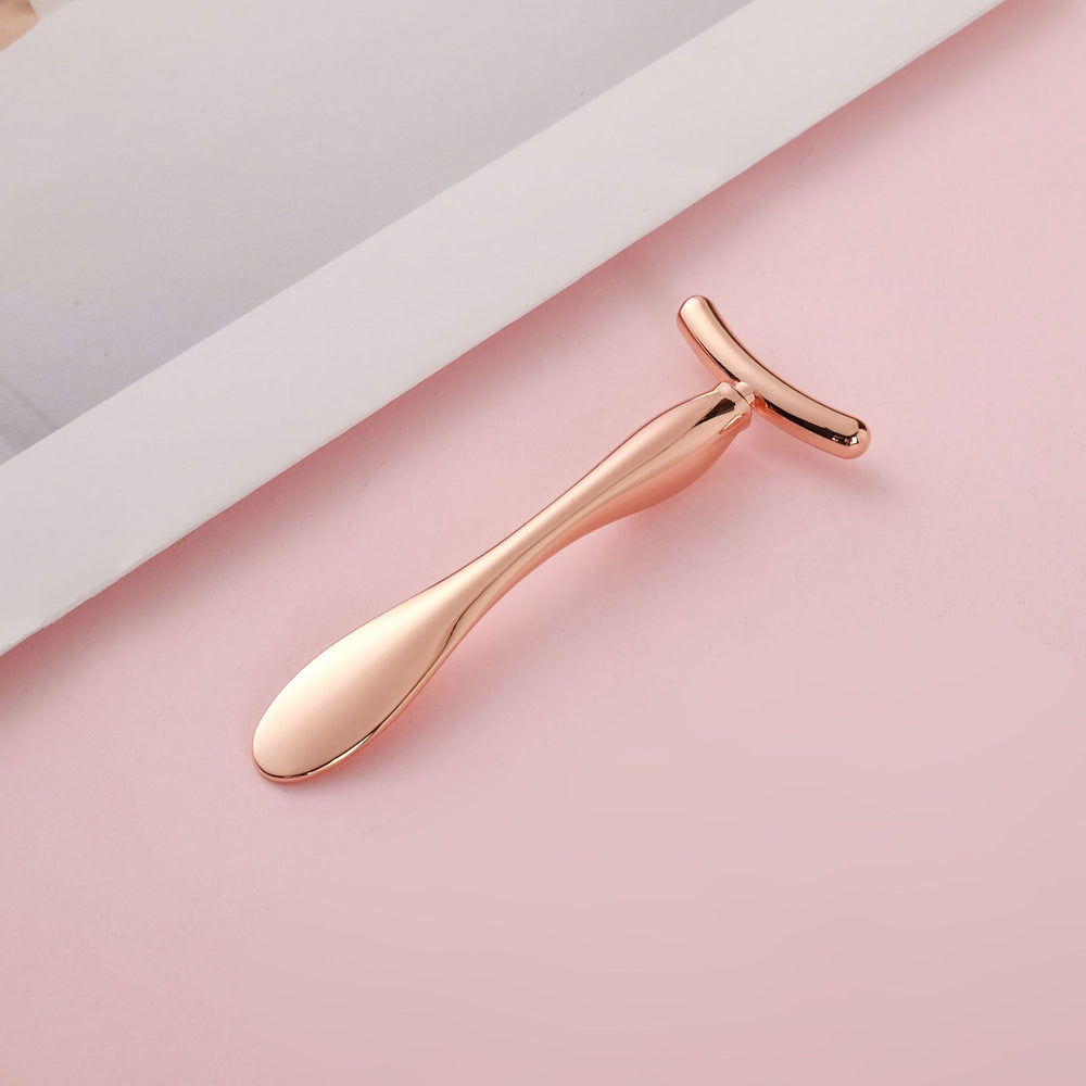 Wholesale large t-shaped facial massage roller, cosmetics essence infusion wand, golden face slimming beauty eye cream applicator