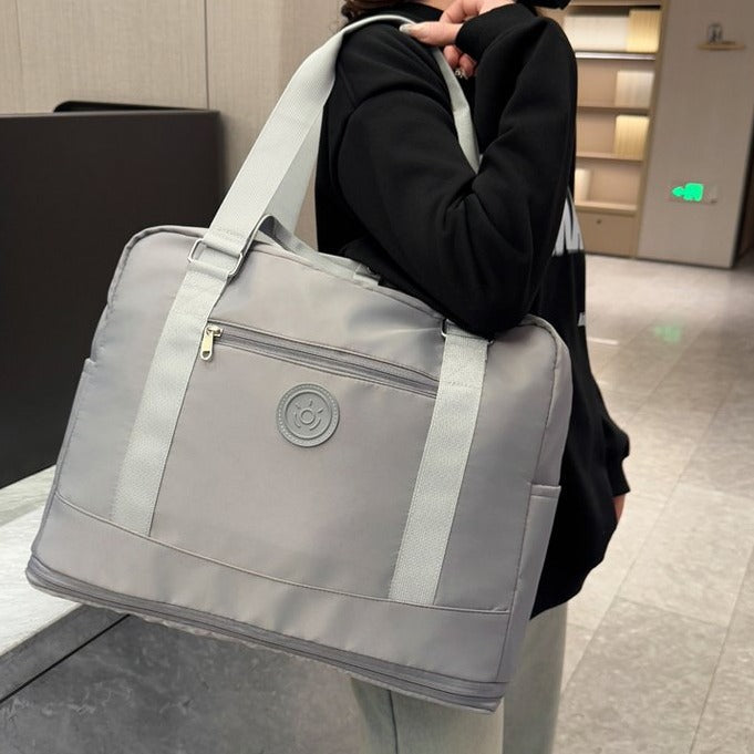 New expandable fitness bag, light luggage storage bag for short trips, large capacity cover, tie rod fashion travel bag.