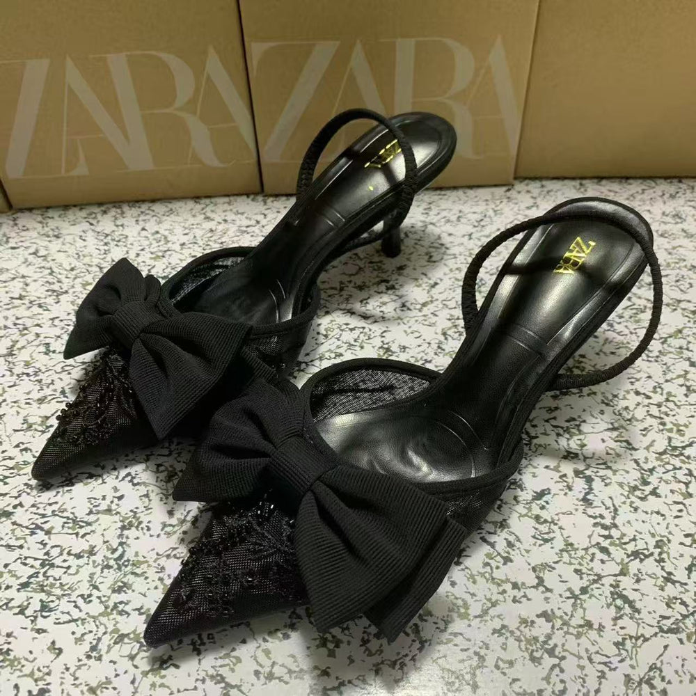 Za's 2025 new women's low-heel pumps: elegant, pointed-toe, ankle-strap flats with black bow detail