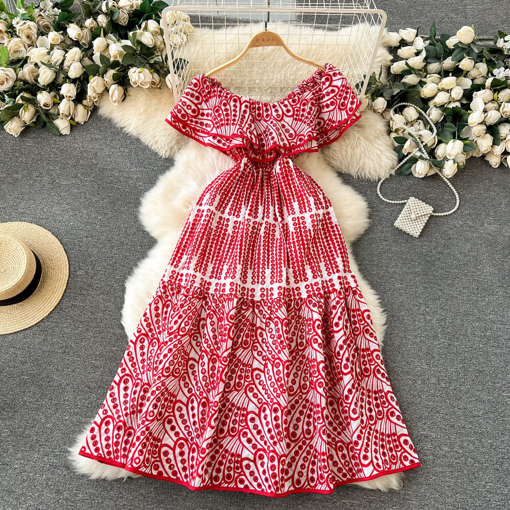 Elegant, sophisticated, and effortlessly chic: this ruffled, off-the-shoulder, lace-embroidered, and cutout maxi dress is perfect for a glamorous beach vacation