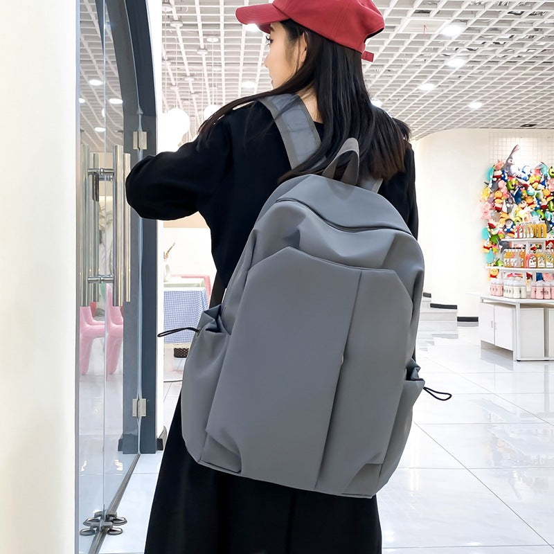 New fashion versatile student composite cloth Korean version trendy fashion boys and girls casual backpack  wholesale