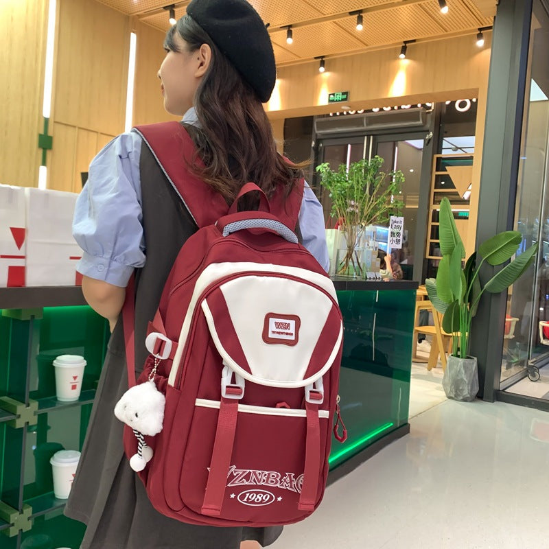 School bag for girls, junior high school students, middle school students, large capacity, versatile burden reduction, fashion trend, high school college students, backpack