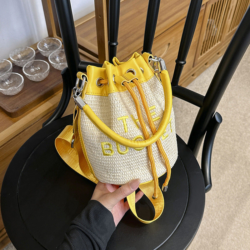 Woven handbag small bag women's new straw bucket bag summer popular niche style shoulder crossbody bag cylinder