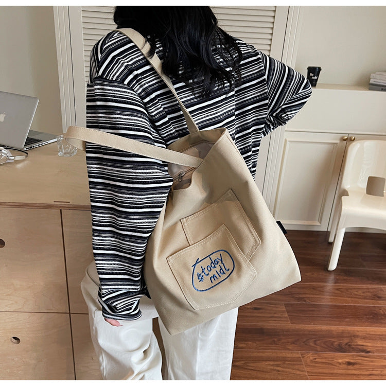 Cross-border canvas bag women's large-capacity 2025 new summer versatile simple shoulder bag casual college student tote bag