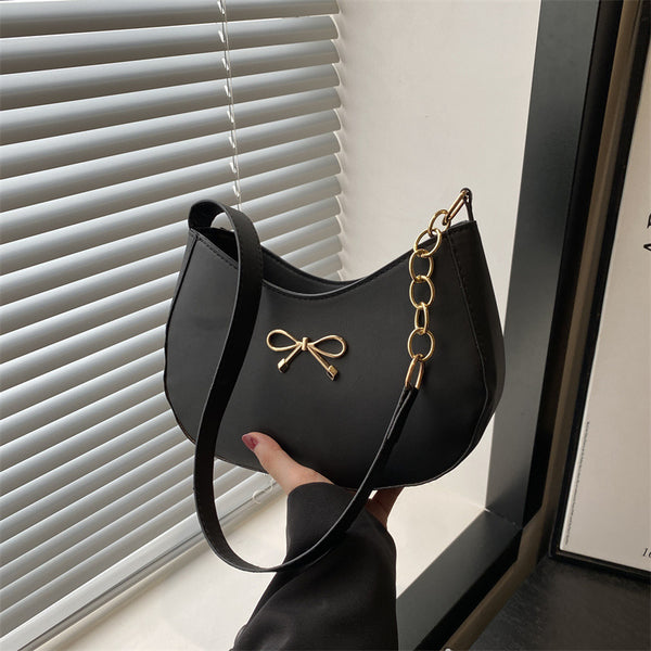 Women's bow handbag 2025 summer new personalized armpit bag Korean version foreign style new moon shoulder bag