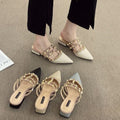 Frenchclassy sense of rivets toe-cap half slippers for women spring and summerflatsoutwear2025k-style patent leather pointed toe sandals