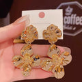 Used vintage flower metal heavy industry earrings-a1631 gold