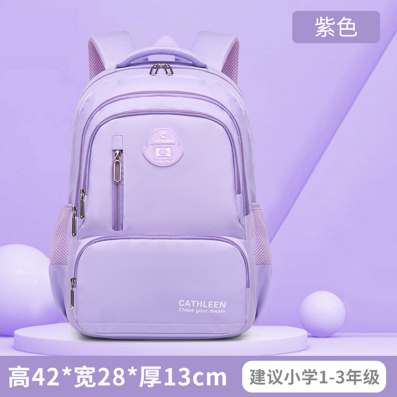 New school bags for primary and secondary school students, boys and girls, junior high school students, large-capacity backpacks, men's burden reduction, good things for school season