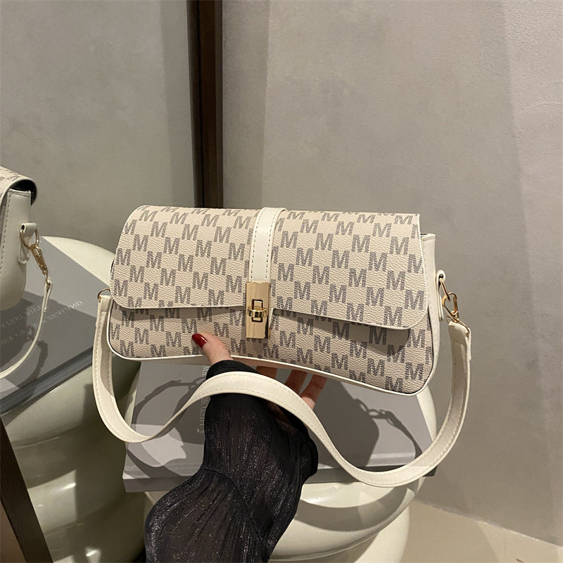 Retro fashion texture small bag women's 2025 summer new solid color versatile shoulder bag commuter underarm bag small square bag