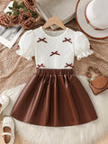girls' autumn new arrival: bubble sleeve bow texture top + pu leather a-line skirt two-piece set