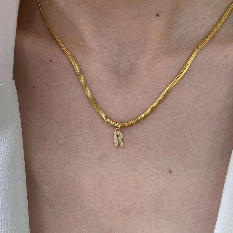 Geometric chic gold-tone blade chain necklace with letter pendant - stainless steel jewelry for women