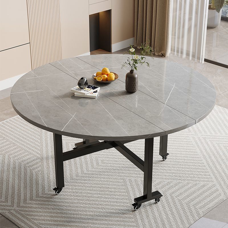 Folding dining table - round, multi-functional, portable, and wheeled - perfect for small spaces