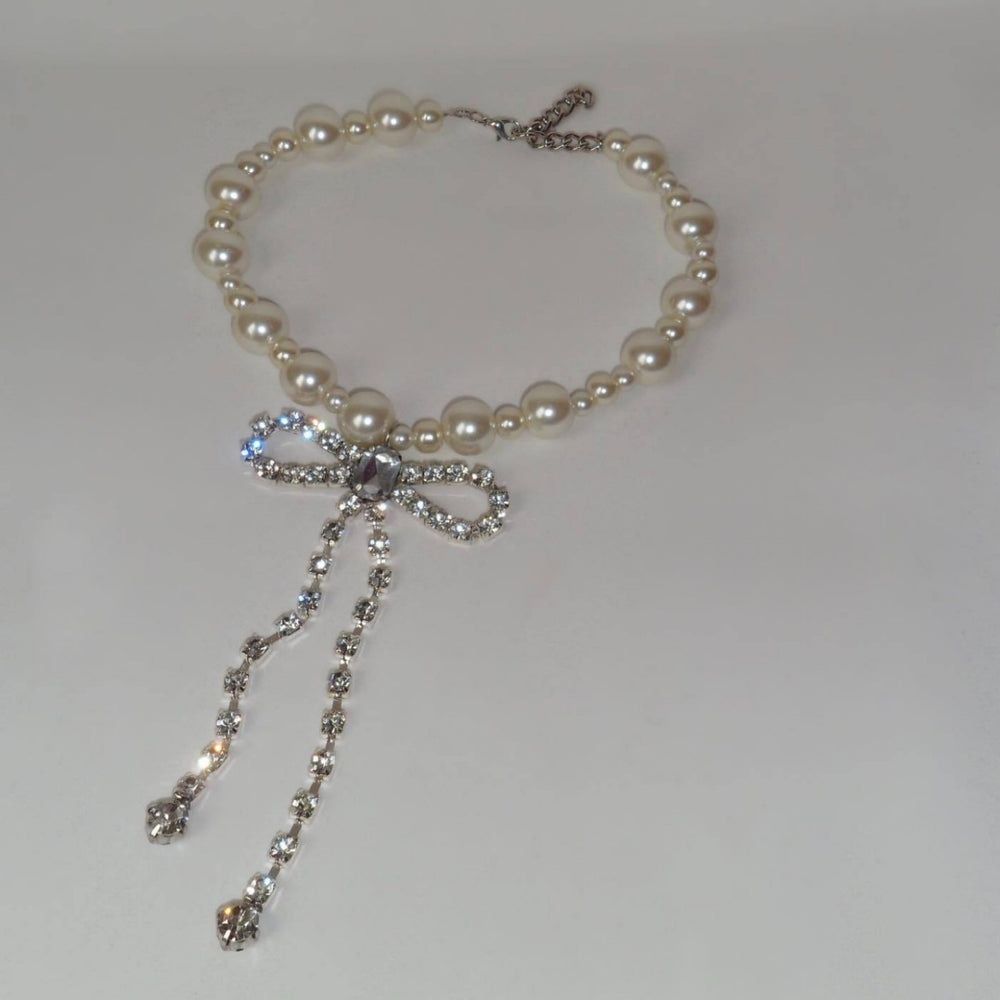 European and american cross-border imitation pearl necklace for women, personalized sweet and cool diamond-encrusted tassel bow choker, high-end collarbone chain