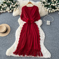 Fashion cross-border miyake pleated dress female v neck waist stereo flower decoration tassel long skirt elegantwork clothing