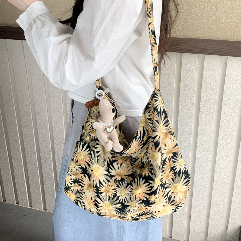 Cross-border new broken flower canvas bag messenger bag shopping bag fashion trend large capacity casual versatile women's shoulder bag