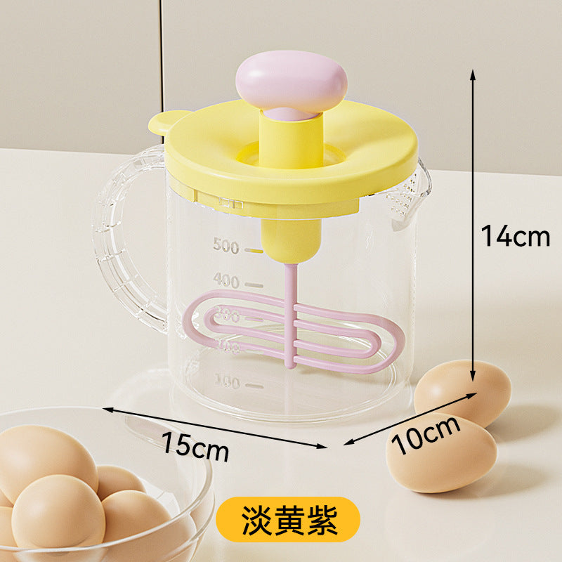 Multifunctional hand mixer with built-in whisk, press-down filter, and egg beater – perfect for cream whipping and baking