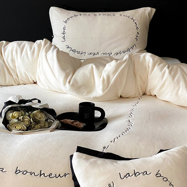 Niche simple winter light luxury high sense thickened milk fleece four-piece warm coral fleece bed sheet quilt cover