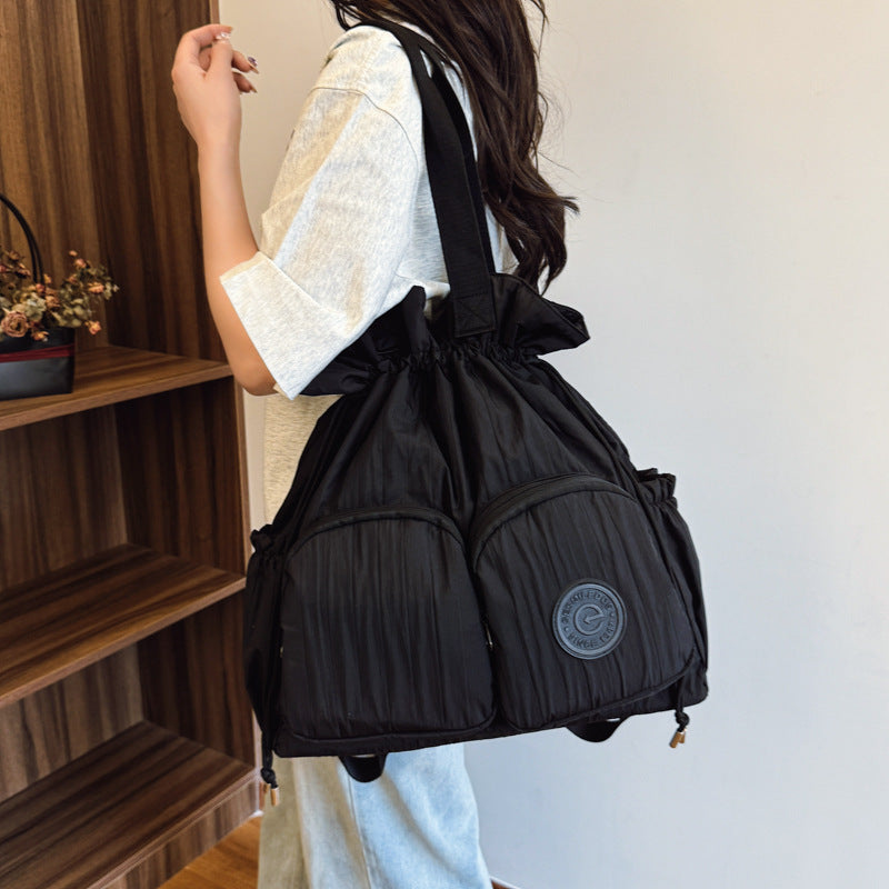 Cross-border college style high-value large-capacity backpack women's 2025 new niche pleated drawstring shoulder bag
