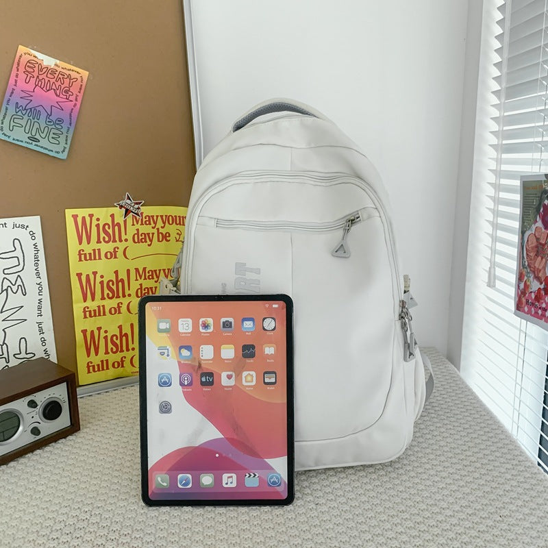 New Korean version of junior high school student schoolbag large capacity lightweight outdoor leisure bag trendy men's and women's backpack