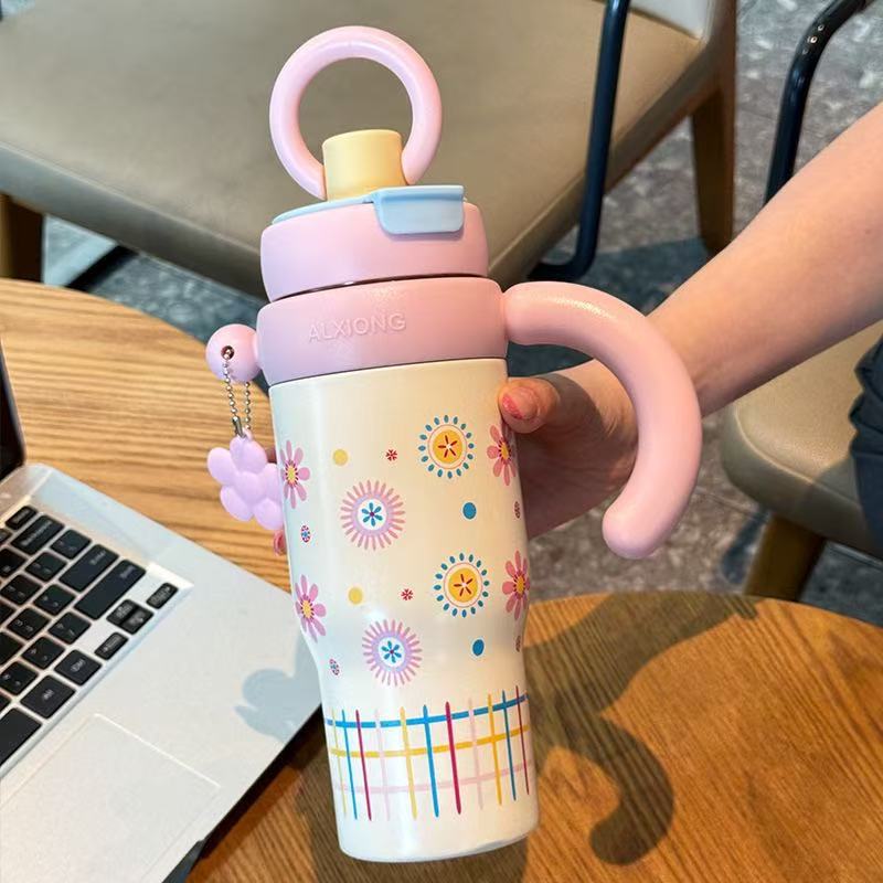 High-style 316 stainless steel insulated tumbler, perfect for outdoor use. portable, large-capacity design with a handle and straw, ideal for kids