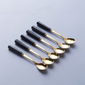 Black gold spoon