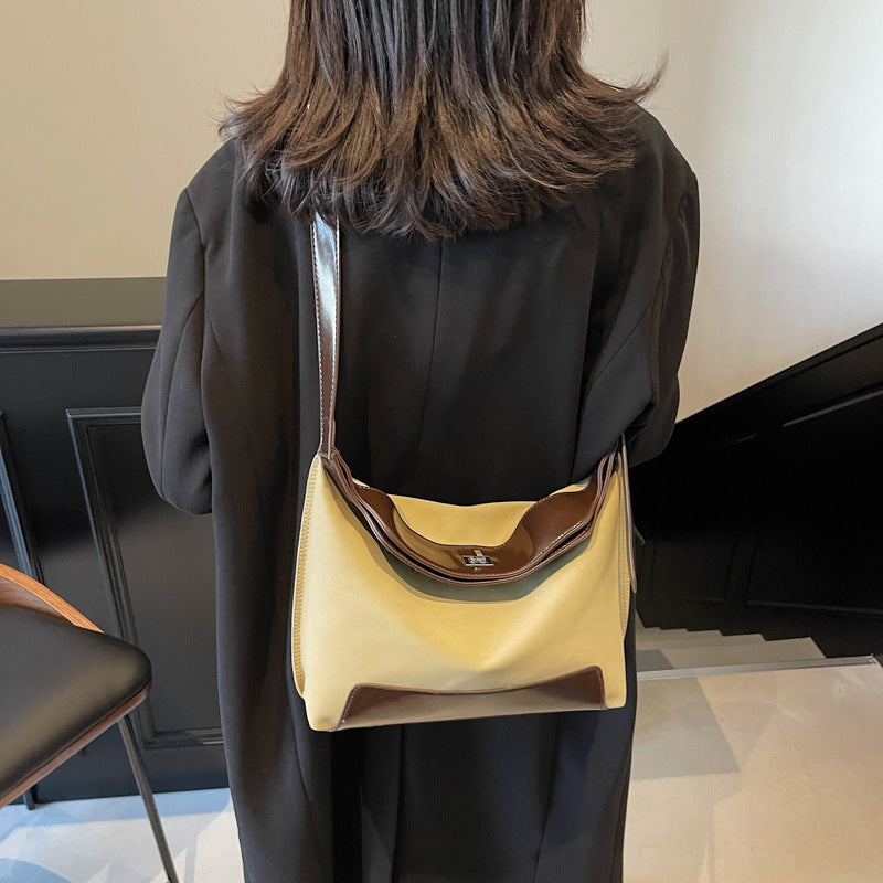 Cross-border design contrasting color splicing canvas bag women's 2025 new fashion trend shoulder messenger women's bag tote bag