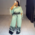 European and american cross-border women's spring  new collection: casual v-neck drawstring printed top and high-waisted wide-leg pants set